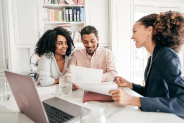 Loan advisor discussing a home loan with a couple